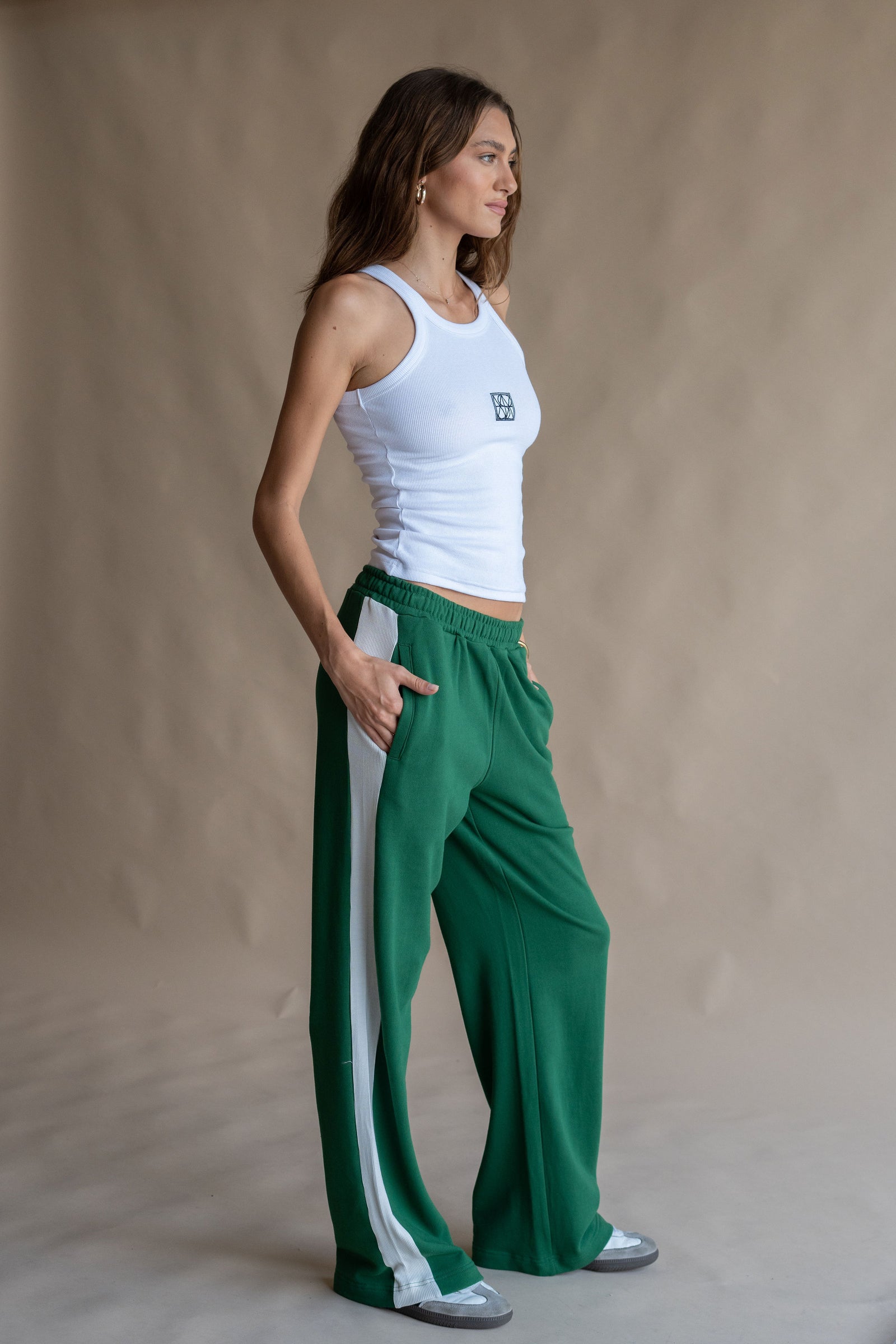 Green and white track pants best sale